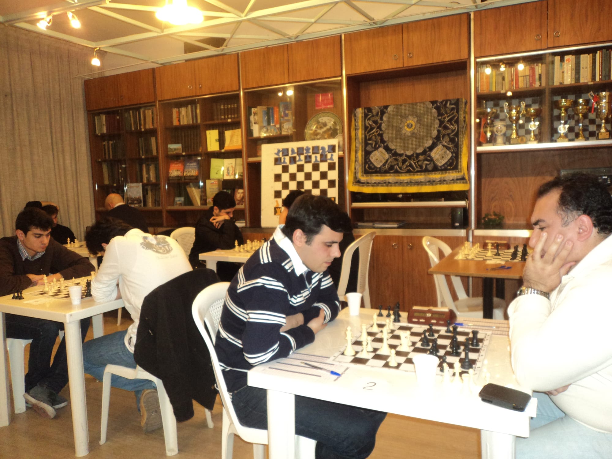 Evening play across the clubs library and trophy room