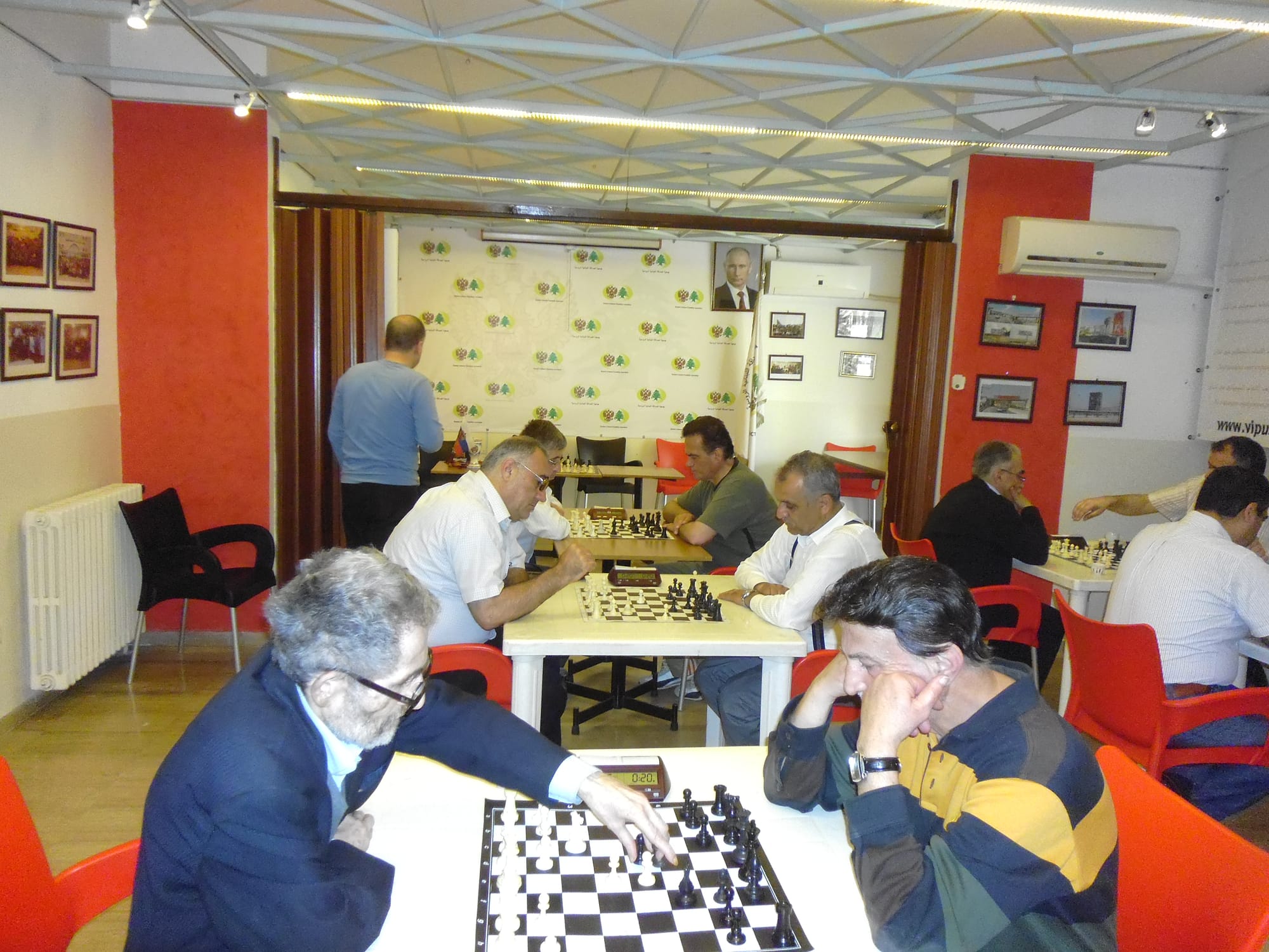 Members absorbed in games across a busy club night