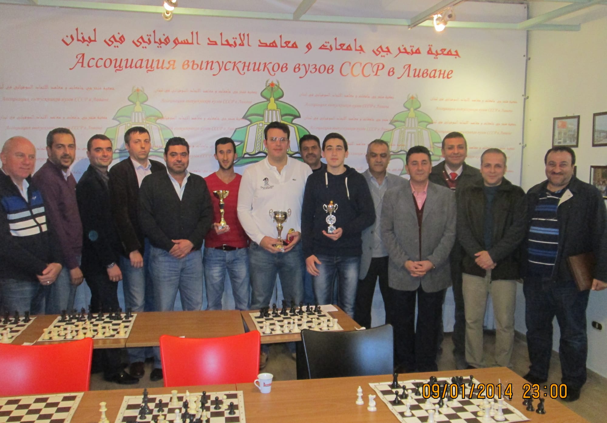 Participants and winners gather with trophies after the final round